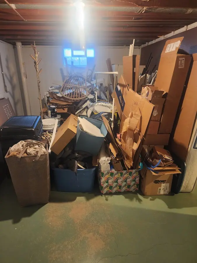 Roll-off dumpster container at job site for 2 Yard Dumpster Rental in Independence